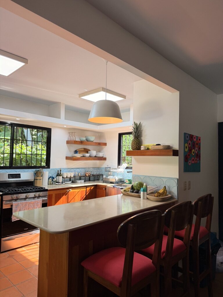 Breakfast bar with three stools